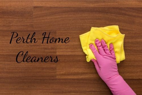 hand in pink glove cleaning wooden floorboards with yellow sponge with words Perth Home Cleaners