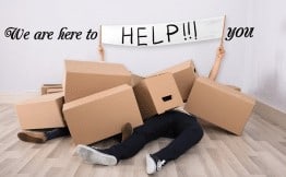 cardboard boxes fallen on people with caption we are here to help you
