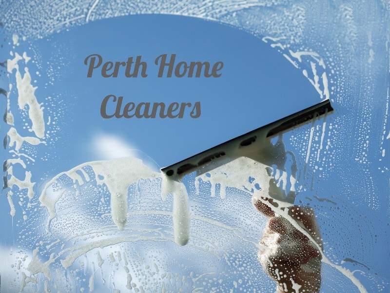 soapy window with a hand using a squeegee to reveal the words Perth Home Cleaners