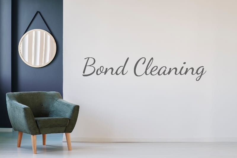 bond cleaning on wall of scandi room with blue and green accents