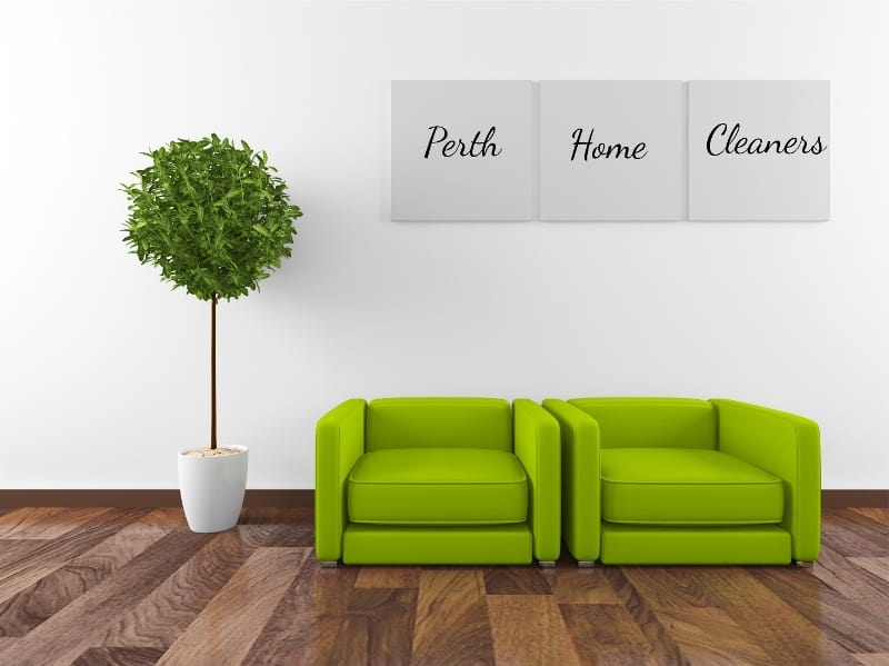 lime green sofas on a polished hardwood floor with a potted tree